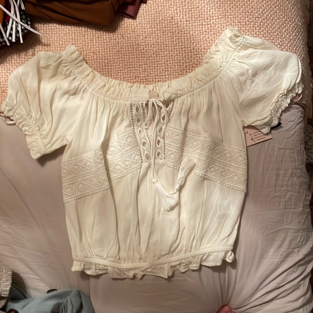 Very cute and flowy cream top